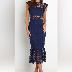 Navy Blue, midi length dress. a lace overlay and high round neckline used once